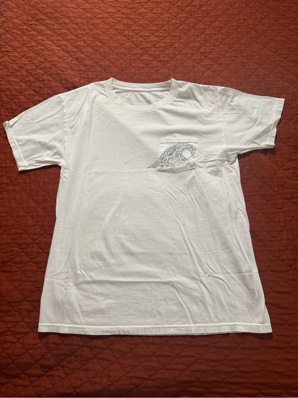 Classic White Pocket Tee with Subtle Graphic